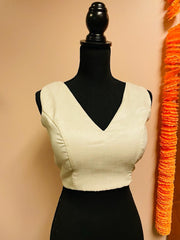 DKF141-Raw silk sleeveless blouse with V-Neck. Can be altered up to size 42