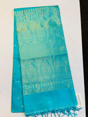 Pure Kanjivaram Handloom Soft Silk saree in Light Blue w/ Gold and Silver Tilakkam Motifs. Comes w/ Zari Pallu and Matching Blouse