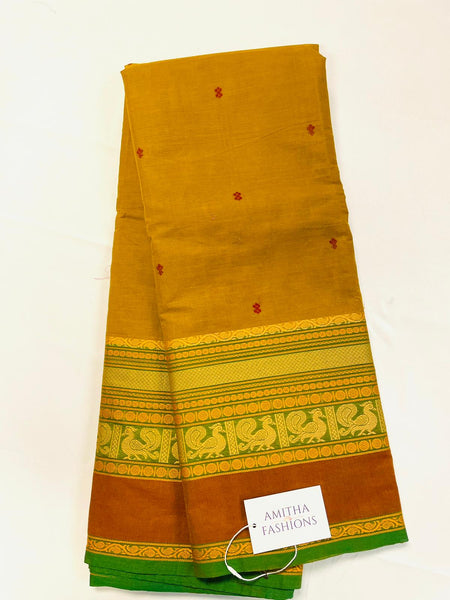Pure Handloom Kanchi Cotton Saree in Greenish Yellow w/ Annam and Rudraksham border. Comes with striped Pallu and Matching Blouse (stitched). Fall Peco done.