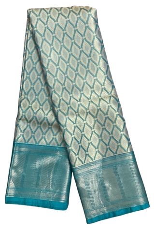 HPSS606 - Banarasi Soft Silk Saree in Silver and Blue Border. Comes with stitched blouse (size 38, can go up to size 42). Fall Peco Done.
