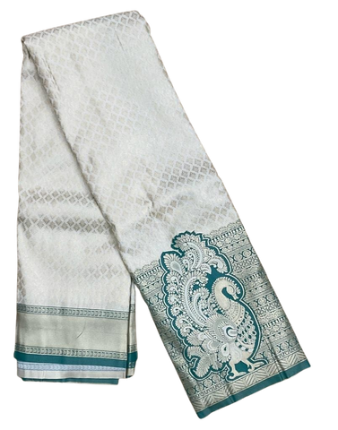 HPSS610 - Banarasi Soft Silk Saree in Silver with Zari Butti all over saree and Dark Green Border with Pecock Motif. Comes with stitched blouse (size 38, can go up to size 42). Fall Peco Done.