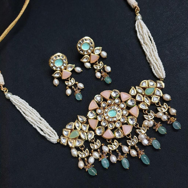 JP529 - kundan Pendant with pink and green stones with pearl chain. Comes with matching earrings