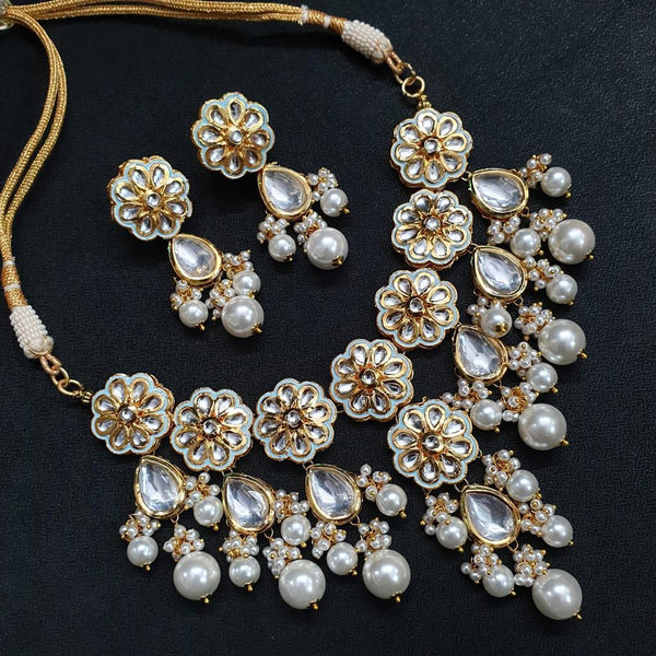 JP530 -Floral Kundan choker set with pearls. comes with matching earrings.