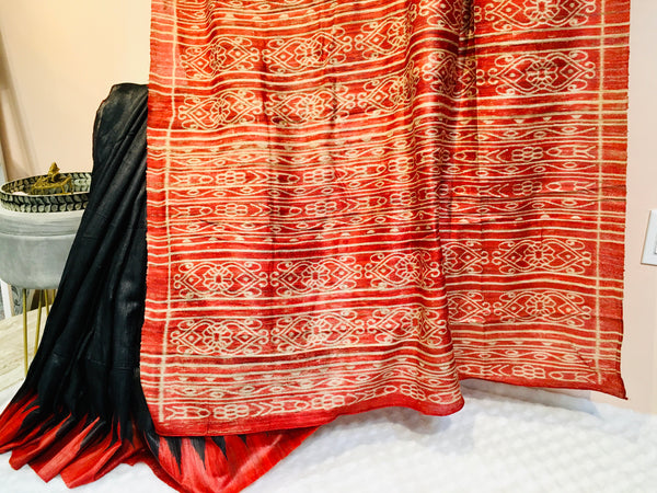 KSP213 - pure zari tussar saree in black with red border.Comes with stitched blouse size 38,can be altered to 42