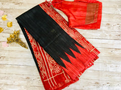 KSP213 - pure zari tussar saree in black with red border.Comes with stitched blouse size 38,can be altered to 42