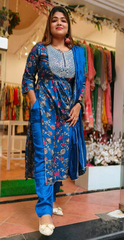 RFSS1220 - Nyra-cut Muslin Floral Printed Kurta with Embroidery on Yoke. Comes with Matching Pants and Dupatta